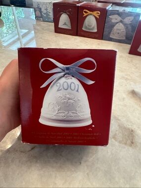 Lladro Porcelain Bell Ornament with Blue Ribbon Accent